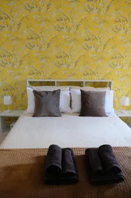 Letto o letti in una camera di Padova Art Apartments 1