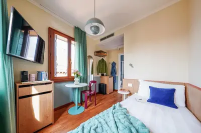 Letto o letti in una camera di Numa Venice Forcola