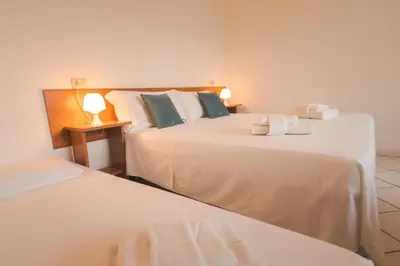 Letto o letti in una camera di Residenza Sant'Antonio - Sottomarina