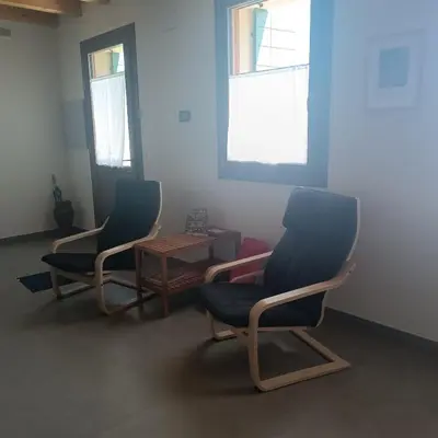 Area soggiorno di Ecofriendly house Colli Euganei