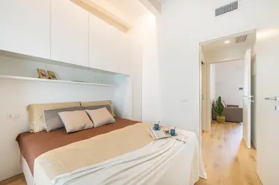 Letto o letti in una camera di Wave Island Batt E18