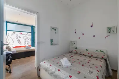 Letto o letti in una camera di Ca' Dandy Large by WelcHome