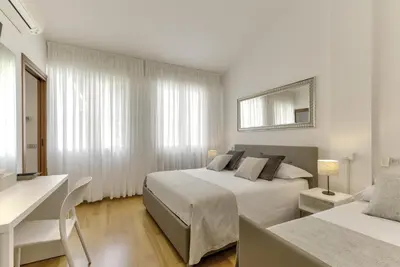 Letto o letti in una camera di Prato della Valle 34 Apartments
