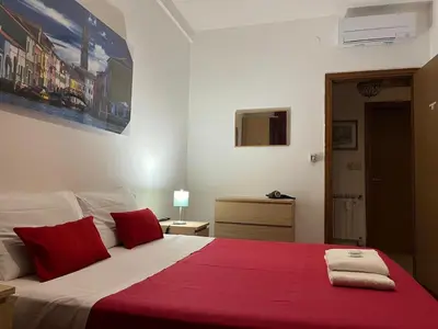 Letto o letti in una camera di Venice Popular Stay