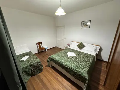 Letto o letti in una camera di Arham Guesthouse Bembo 11