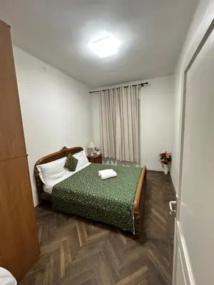 Letto o letti in una camera di Arham Guesthouse Bembo 13