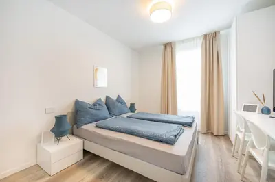 Letto o letti in una camera di Wave Island Rap I9