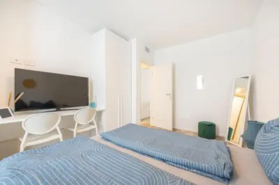 Letto o letti in una camera di Wave Island Rap I9