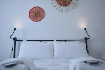 Letto o letti in una camera di Welc-ōM Padova Panta Rei rooms