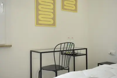 Letto o letti in una camera di Welc-ōM Padova Panta Rei rooms