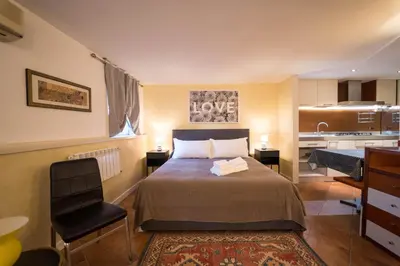 Letto o letti in una camera di Ca d'Oro Monolocale
