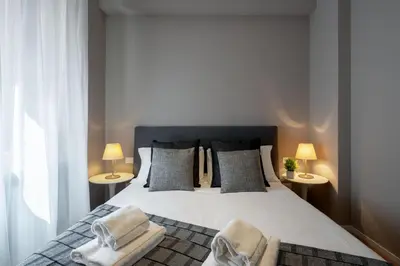 Letto o letti in una camera di San Marco Boutique by Wonderful Italy