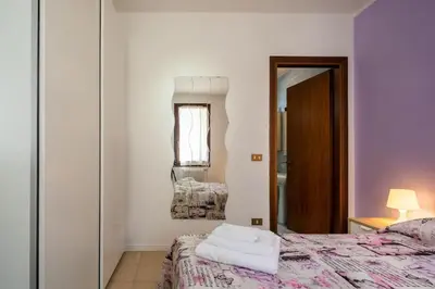 Letto o letti in una camera di Comfort Flat Vicenza with parking!