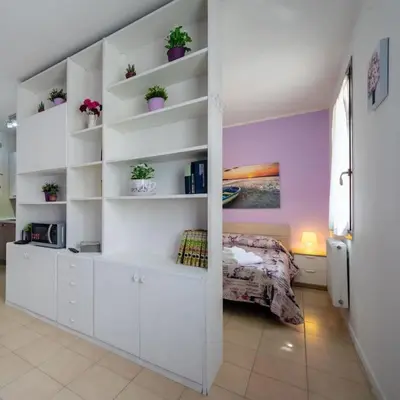 Letto o letti in una camera di Comfort Flat Vicenza with parking!