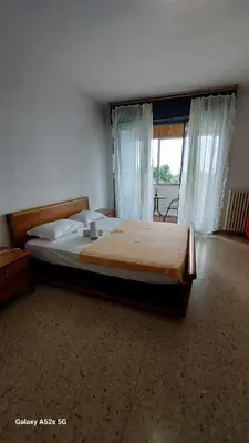 Letto o letti in una camera di # Punto FM 4#