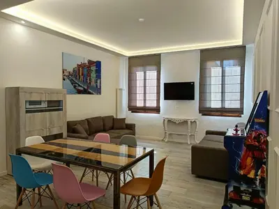 TV o dispositivi per l'intrattenimento presso Luxury Apartments Riva Vena VISTA CANALE