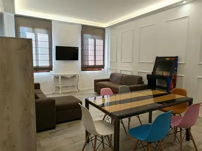 TV o dispositivi per l'intrattenimento presso Luxury Apartments Riva Vena VISTA CANALE