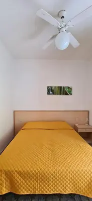 Letto o letti in una camera di Summer Vibes