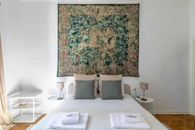 Letto o letti in una camera di Palazzo Calvi di Coenzo - Padova
