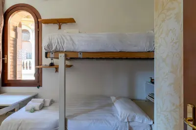 Letto o letti in una camera di Casa Mocenigo - Lido di Venezia