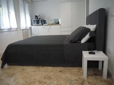 Letto o letti in una camera di Le Gardenie di Tito