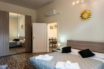 Letto o letti in una camera di Ca' Trapolin Venezia WIFI center city 520