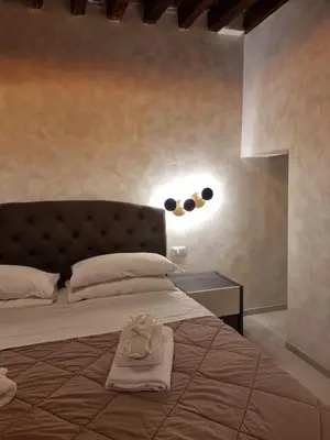 Letto o letti in una camera di San Marco 3097 - LuxuryJacuzzi