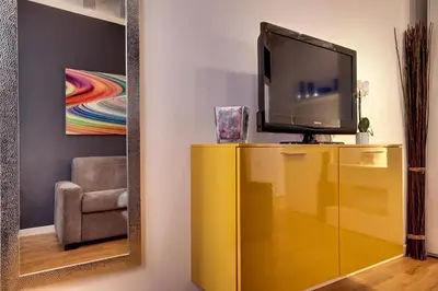 TV o dispositivi per l'intrattenimento presso Charming Castello Apartments by Wonderful Italy