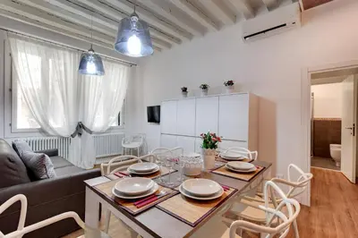 Area soggiorno di Charming Castello Apartments by Wonderful Italy
