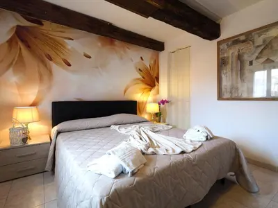 Letto o letti in una camera di Palazzo Preziosa - Rialto