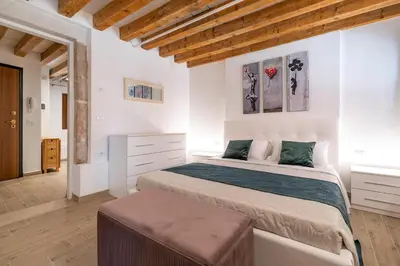 Letto o letti in una camera di Palazzo Preziosa - Rialto