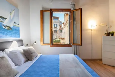 Letto o letti in una camera di Sea to Sky Apartments by Wonderful Italy