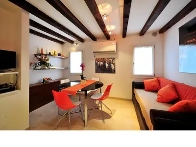 TV o dispositivi per l'intrattenimento presso Palace La Vida Apartments by Wonderful Italy