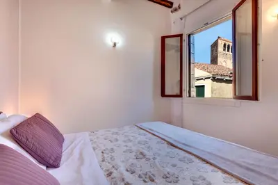 Letto o letti in una camera di Botteri Palace Apartments by Wonderful Italy
