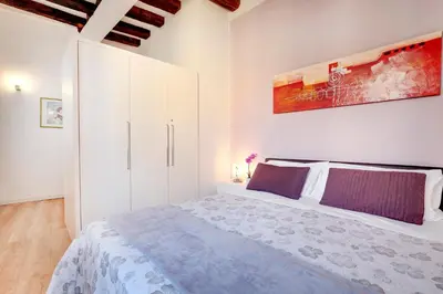 Letto o letti in una camera di Botteri Palace Apartments by Wonderful Italy