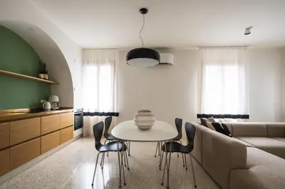 Area soggiorno di San Domenico Apartment with Garden View R&R