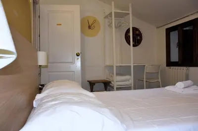 Letto o letti in una camera di Lo Scrigno