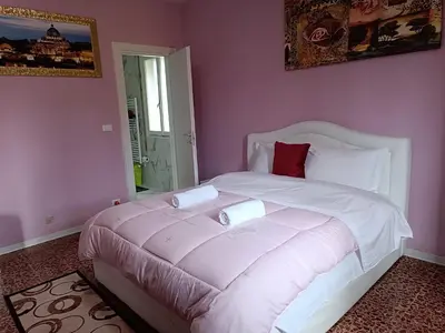 Letto o letti in una camera di Locazione turistica 2