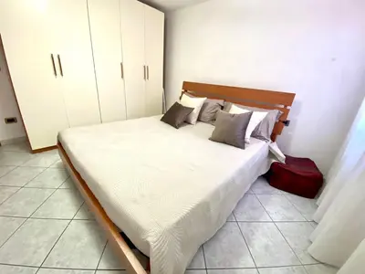 Letto o letti in una camera di La caletta