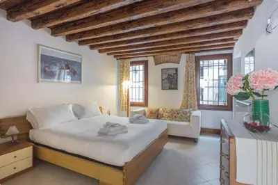 Letto o letti in una camera di Corte Nova Apartment
