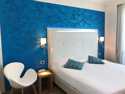 Letto o letti in una camera di Hotel Europa
