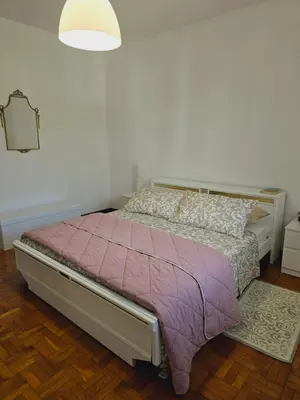 Letto o letti in una camera di Villa Riviera