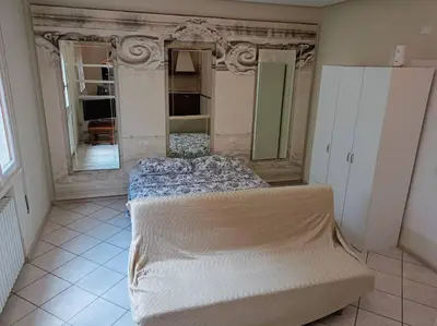 Letto o letti in una camera di Spillo Short Rent Affitti brevi
