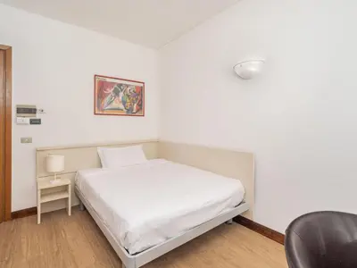 Letto o letti in una camera di B&B HOTEL Eurorest Conegliano