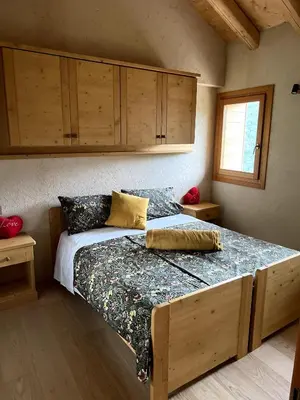 Letto o letti in una camera di Sul Collagù