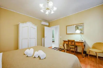 Letto o letti in una camera di Santo Stefano Palace