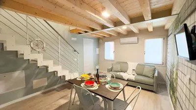 Area soggiorno di Graceful Apartments Paradise by Ca-Sa Check