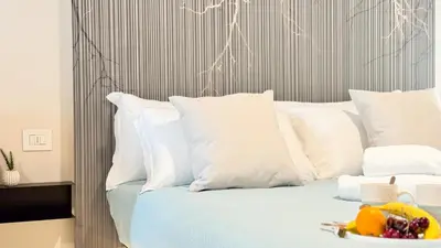 Letto o letti in una camera di Graceful Apartments Purgatory by Ca-Sa Check