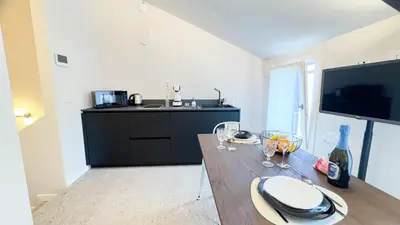 Cucina o angolo cottura di Graceful Apartments Hell Apartment by Ca-Sa Check
