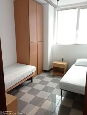 Letto o letti in una camera di Appartamento per 6 Lavoratori